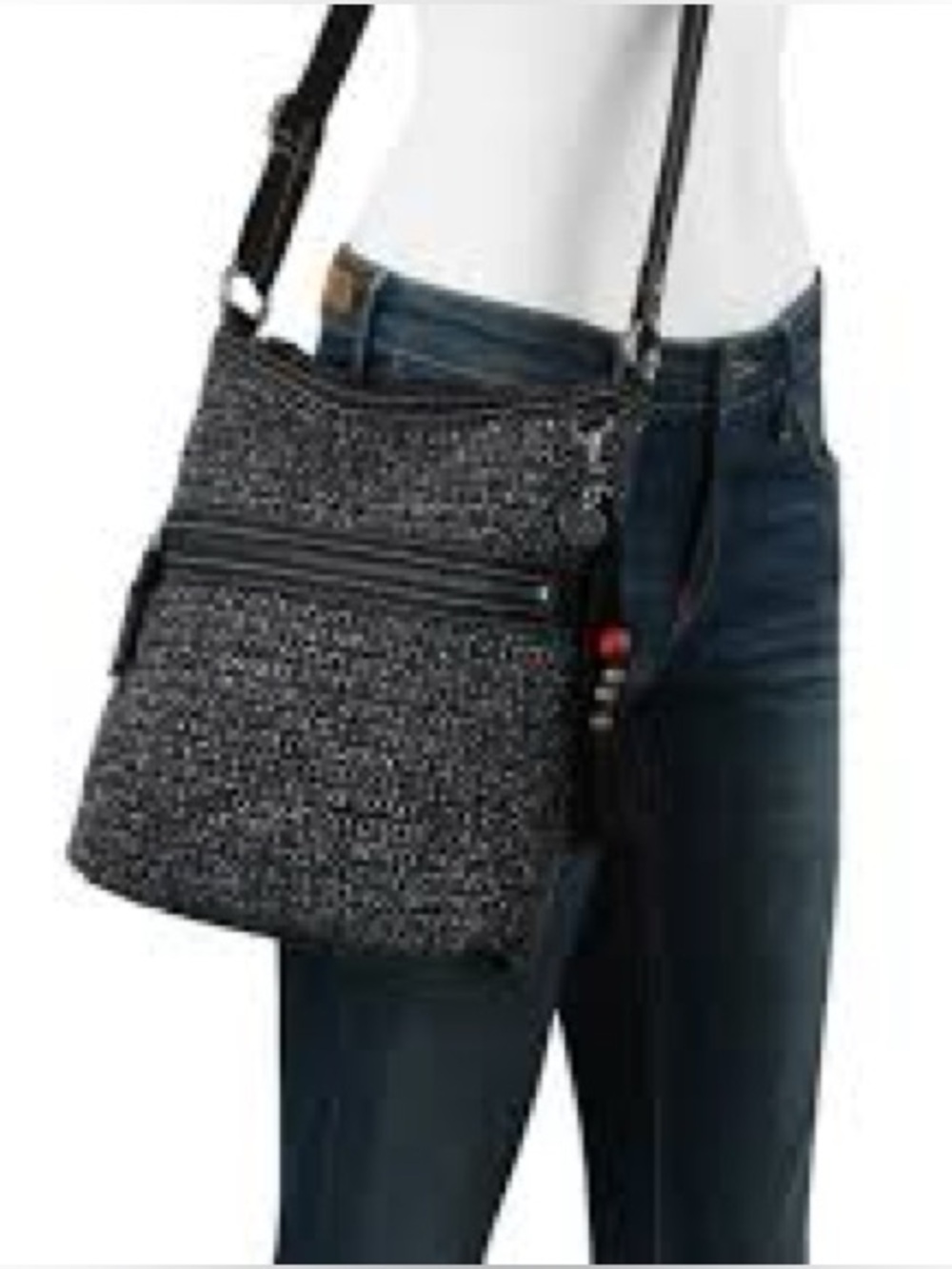 The Sak Black Woven Crossbody Bag with Tassel Charm